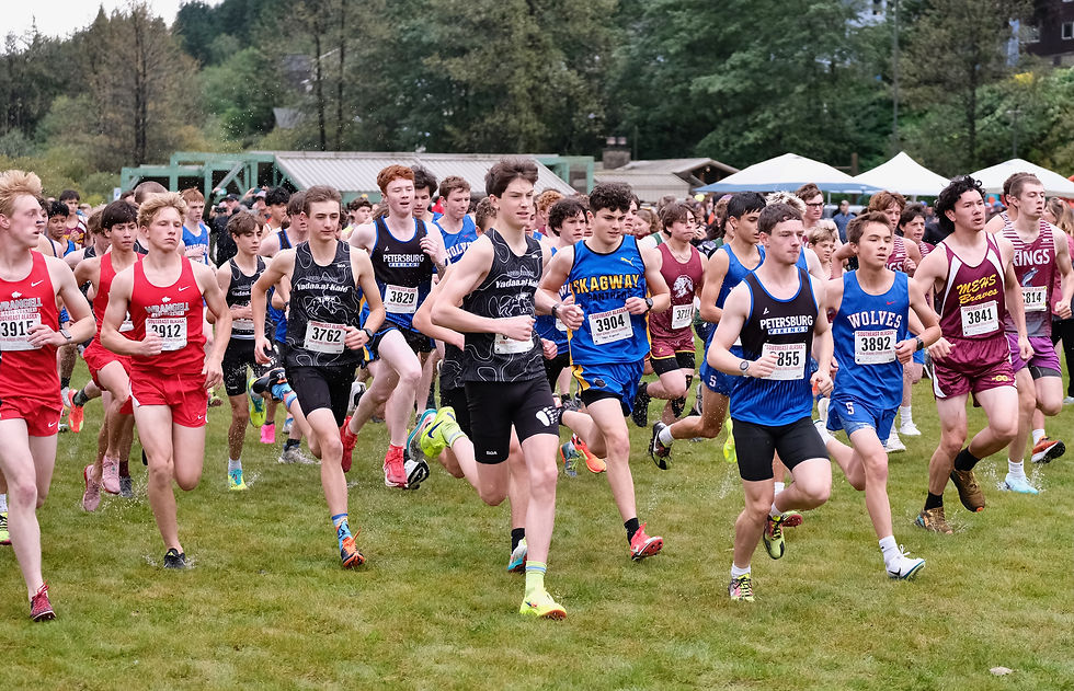 Runners race to the start of the Capital City Invitational boys race last weekend at Sandy Beach. The Southeast Region V Championships are Saturday, Sept. 27, 2025, in Sitka. (Klas Stolpe / Juneau Independent)