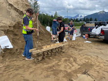 JDHS football team volunteers sandbag help for neighborhoods preparing for flood