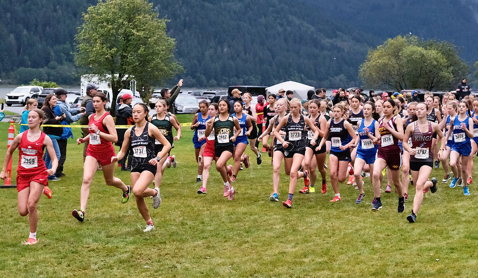 Runners race to the start of the Capital City Invitational girls race last weekend at Sandy Beach. The Southeast Region V Championships are Saturday, Sept. 27, 2025, in Sitka. (Klas Stolpe / Juneau Independent)