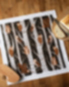 dish towel with image of owls in a forest