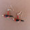 Thumbnail: Scarlet Tananger Fetish Earrings by Matt Mitchell
