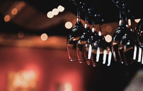 Wine Glasses Hanging from Rack