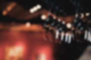 Wine Glasses Hanging from Rack