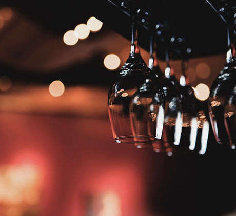 Wine Glasses Hanging from Rack