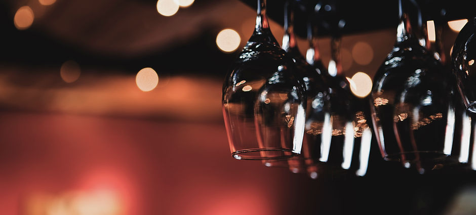 Wine Glasses Hanging from Rack