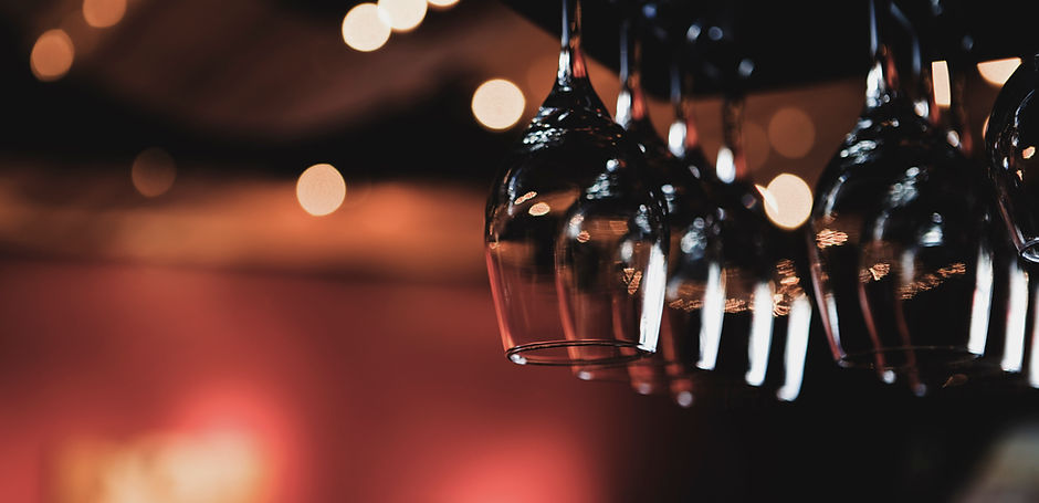 Wine Glasses Hanging from Rack