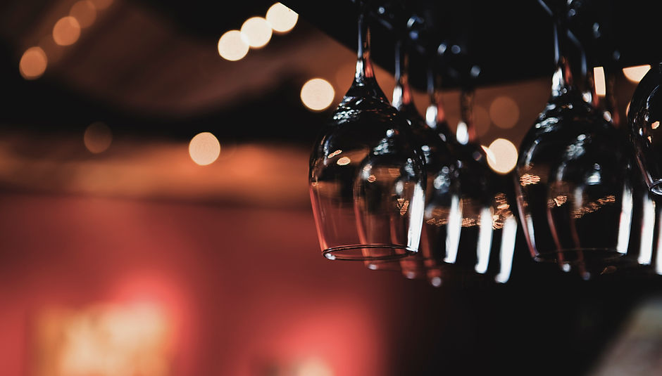 Wine Glasses Hanging from Rack