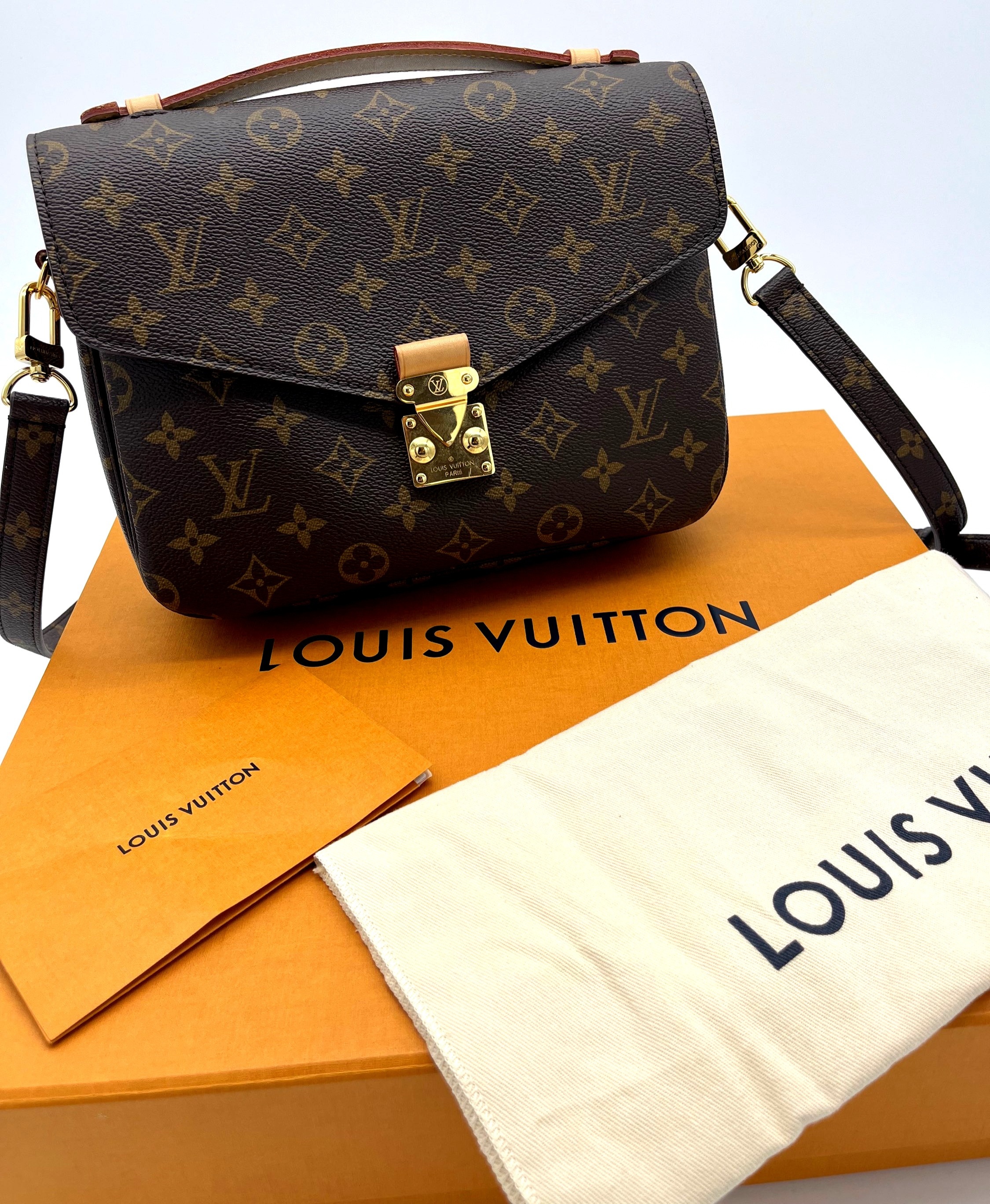 Louis Vuitton MM Coated Canvas — pre-loved Louis Vuitton at The Handbag Room Australia
