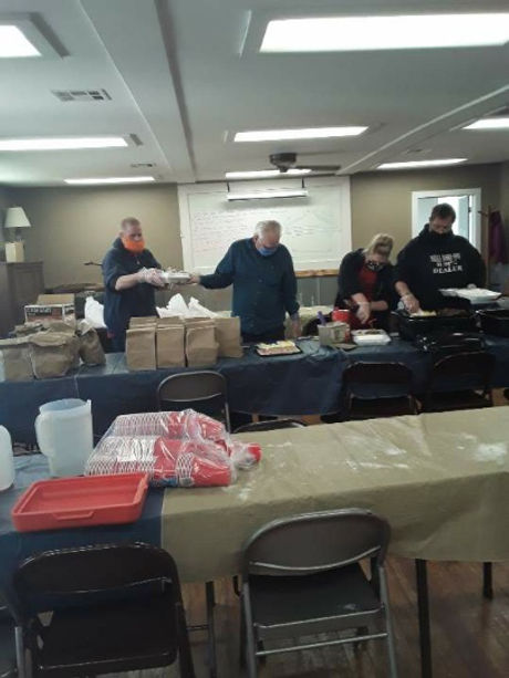 Volunteers Serving Lunch.jpeg