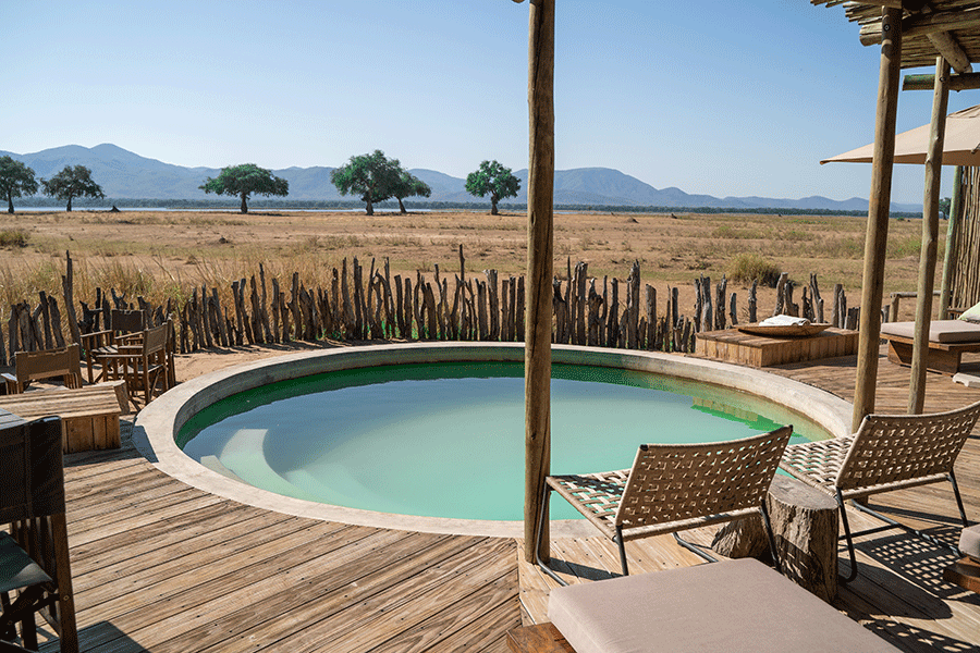 Plunge pool and deck with views of the floodplain at Nyamatusi Mahogany Mana Pools