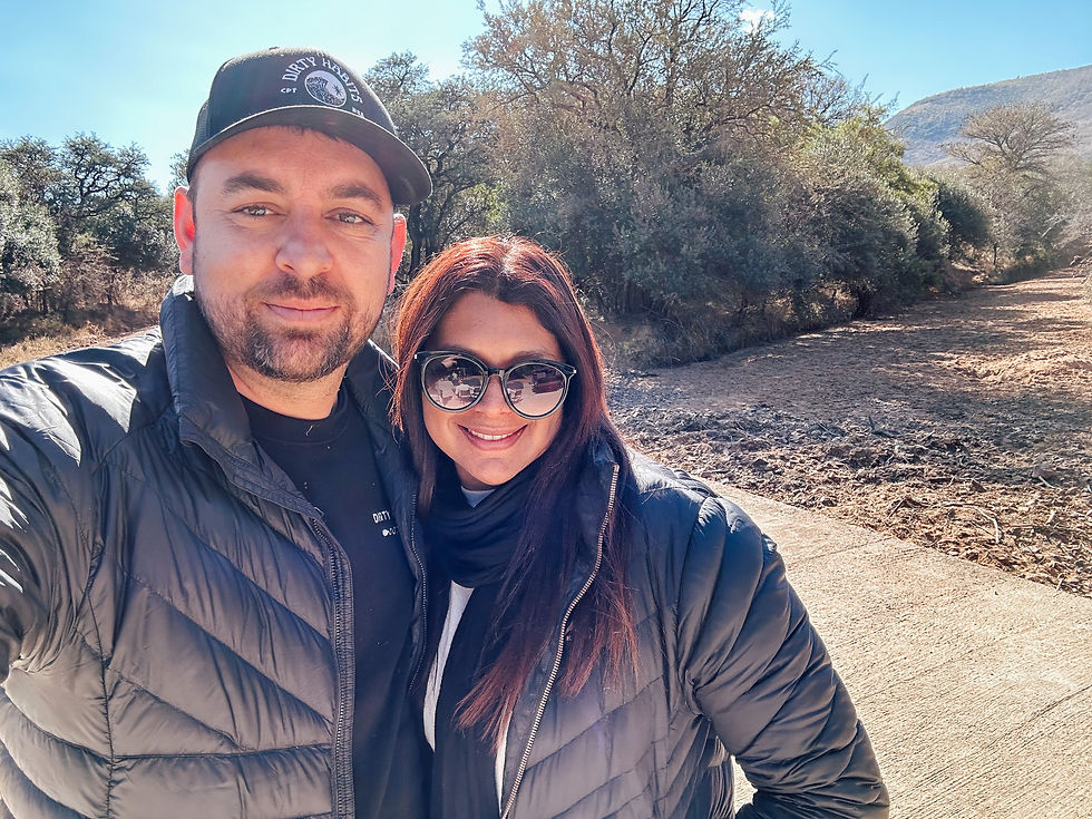Craig Howes and travel companion on a game-drive track at Qwabi Private Game Reserve in the Waterberg.