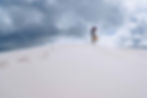 Girl stands on the Sand Dunes in Atlantis