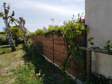 Création de cloture en panneau de bois