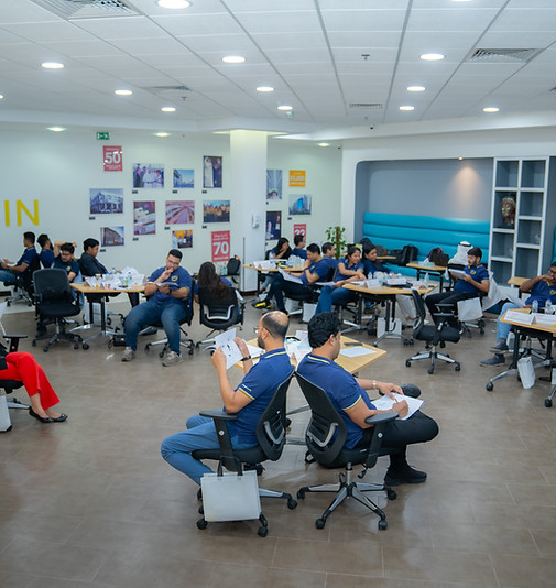 Participants engaging in role-play scenarios at a Forward Training workshop to practice leadership and communication skills.