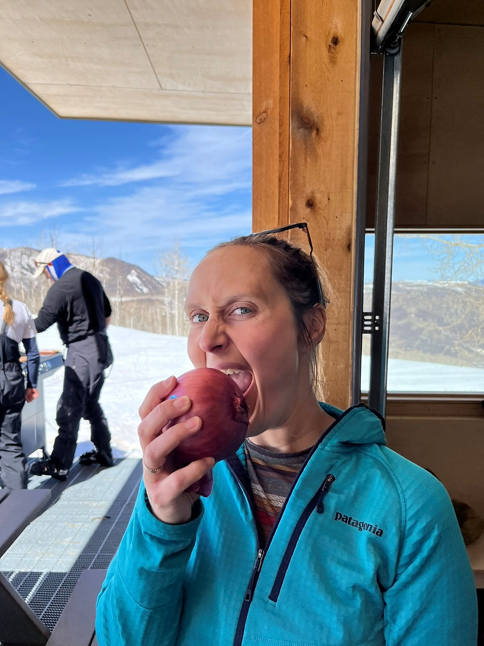Katie eats an Onion in tribute to Gus