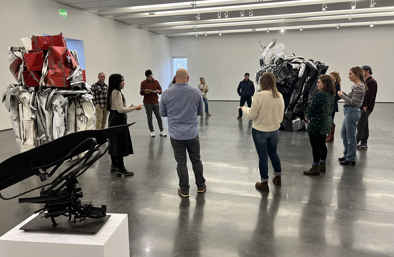 Z Group team at the aspen art museum tour looking at Chamberlain's art