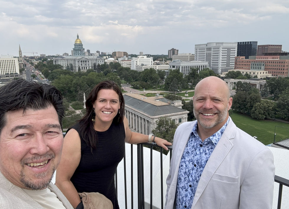 Z Group leaders pose atop a Denver rooftop during Luxe Interiors + Design’s 100th Issue Celebration. The Colorado State Capitol and city skyline form a dramatic backdrop, reinforcing Z Group’s expanding presence across the state’s design scene.