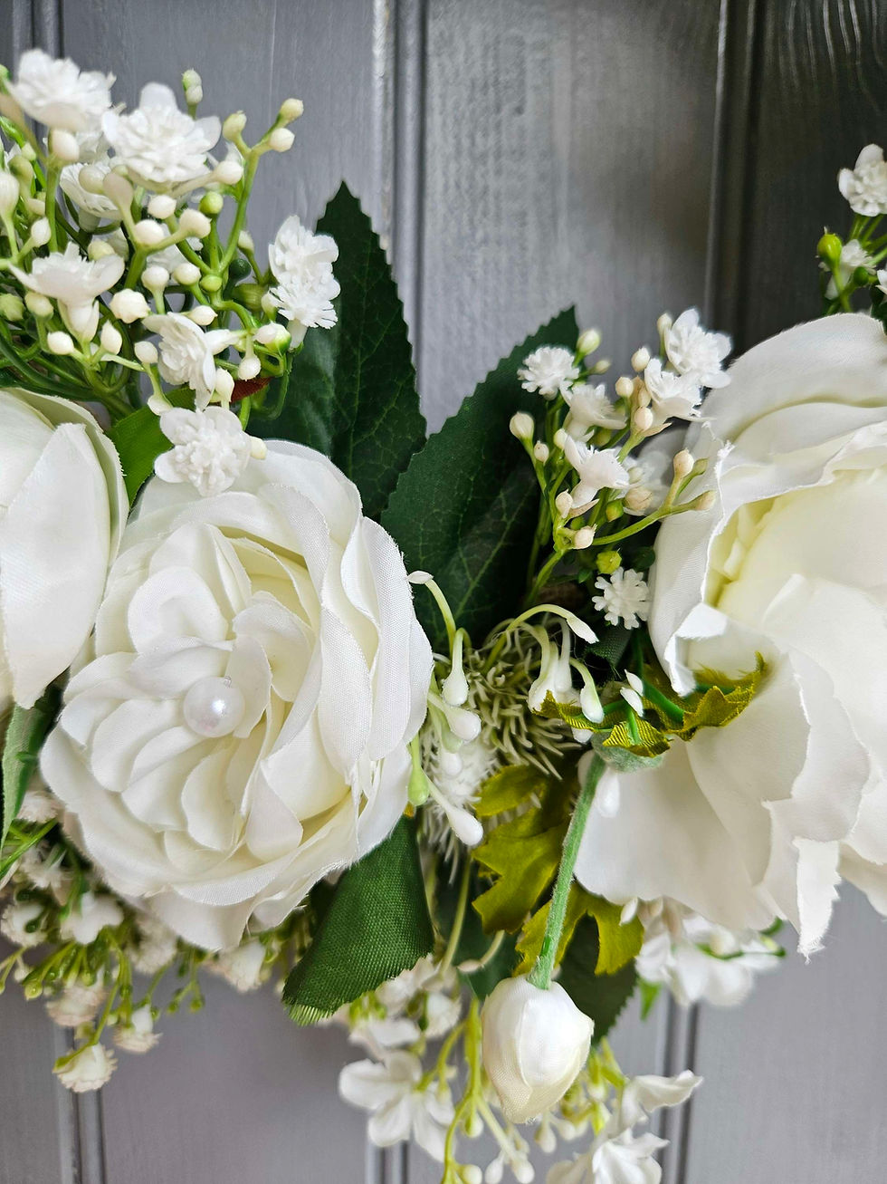 Thumbnail: White gypsophillia, peonies, camellia and roses.
