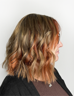 orange blonde curly bob hair