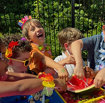 Students eating watermelon