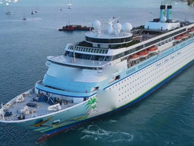 Cruise ship for sale or charter, medium-to-large passenger vessel with multiple outdoor decks