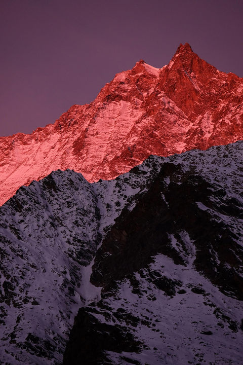 First light hitting Dom Mountain, the highest peak near Saas-Fee, Switzerland.