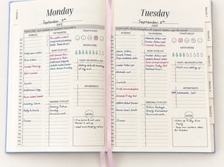 Open Campbell Creations weekly planner showing Monday and Tuesday pages with appointments, priorities, to do lists, and notes