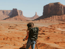 Woman backpacking in Monument Valley, Arizona, USA