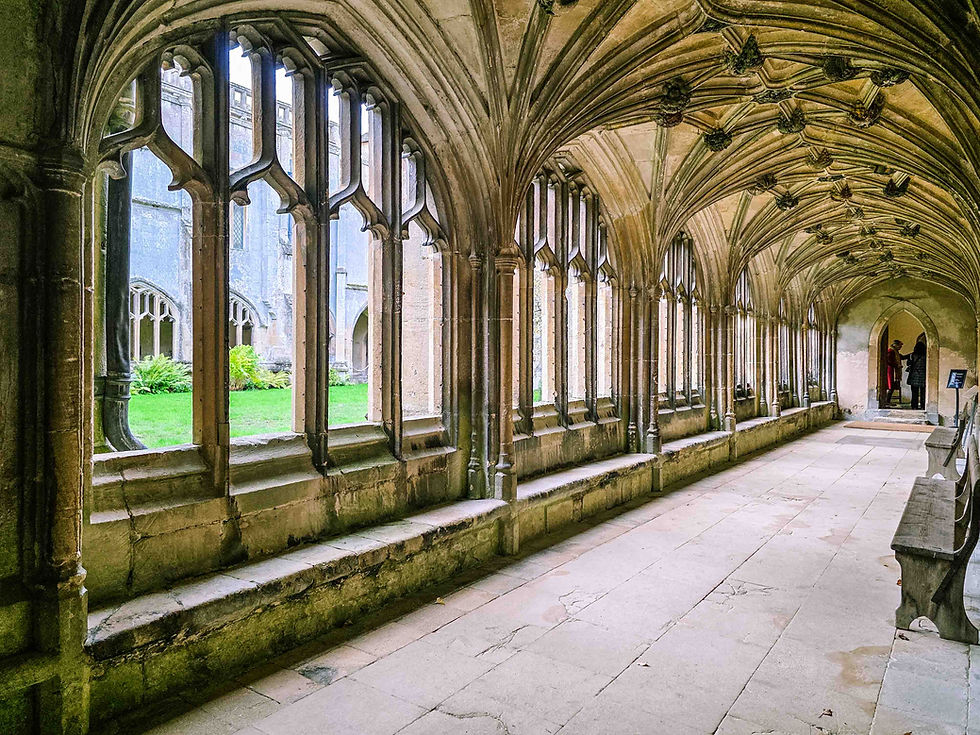 The Cloisters at Lacock Abbey in Wiltshire, England | Photo by Jodi Howe/Between Trips Travel