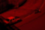 a white truck driving down a race track_edited_edited-2.jpg