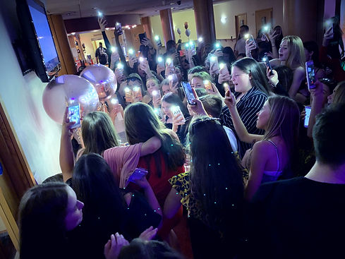 large group of teenagers taking photos at a party in Essex - Teen DJ Essex - MMENT