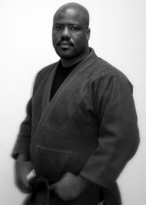 Bowie MMA Coach, Charles Cherry, earns Brazilian Jiu Jitsu Brown Belt from BJJ Red Belt Sergio Penha/Carlos Catania