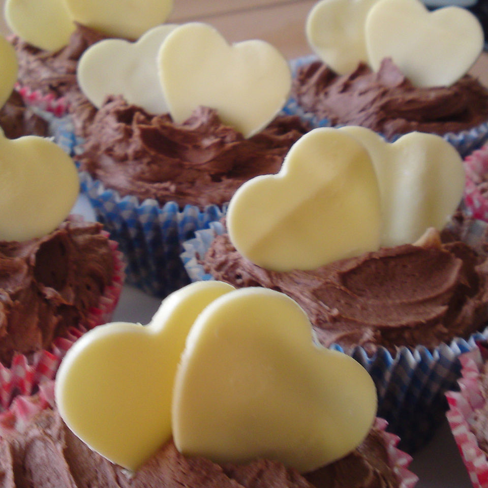 Chocolate cupcakes with white hearts