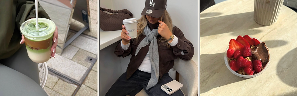 Person holding iced matcha latte outdoors. Another person in a cap has coffee indoors, phone on lap. Bowl of berries and chocolate on a table.