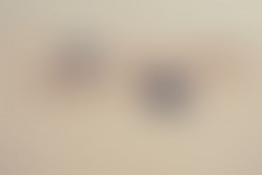 Letter blocks lined up to spell out step by step, on a wooden table