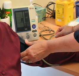 Patient getting blood pressure taken