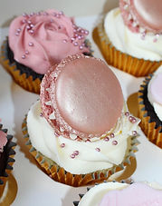 Picture of a cupcake with a macron on top