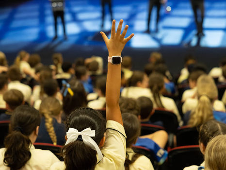 Student raising their hand at a Hot Potato Band workshop