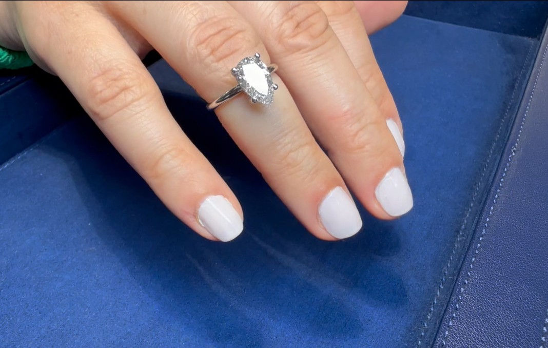 Pear shape hidden halo 2.03 carat evs1 white gold band