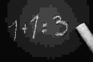 Addition equation on blackboard