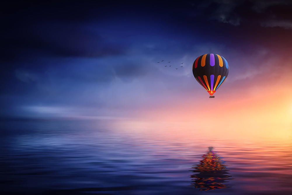 Hot air balloon over water