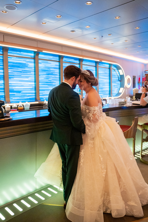 Bride and Groom in Starwars Hyperspace Lounge on Disney Wish by Disney Wedding Photographer Adrianna Gunn