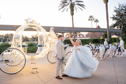 Bridal Portraits in Cinderella's Carriage for a Disney Fairytale Wedding at Disney's Grand Floridian Resort and Spa by Disney Wedding Photographer Adrianna Gunn