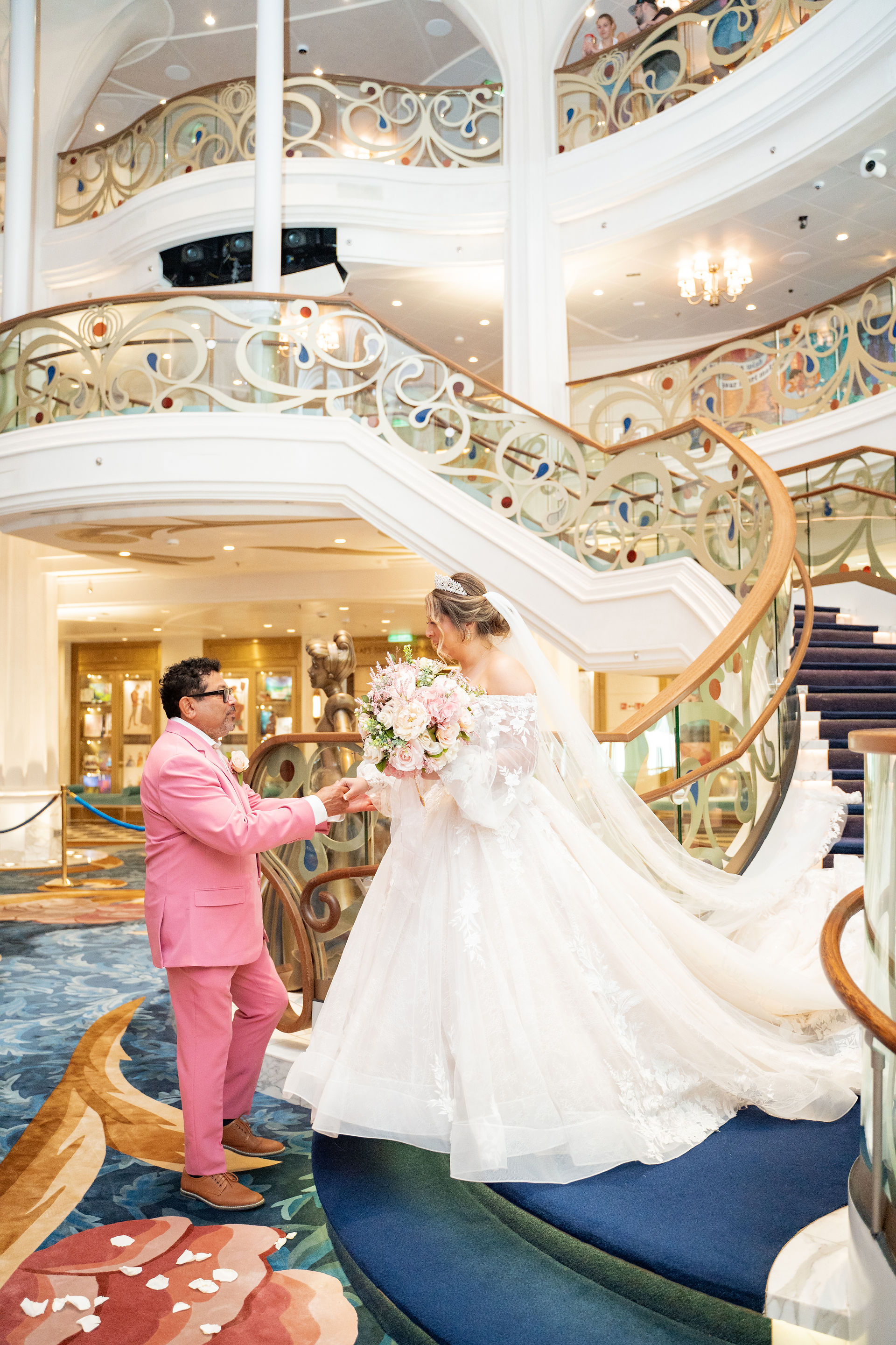 Wedding Ceremony in Grand Hall of the Disney Wish by Disney Cruise Wedding Photographer Adrianna Gunn
