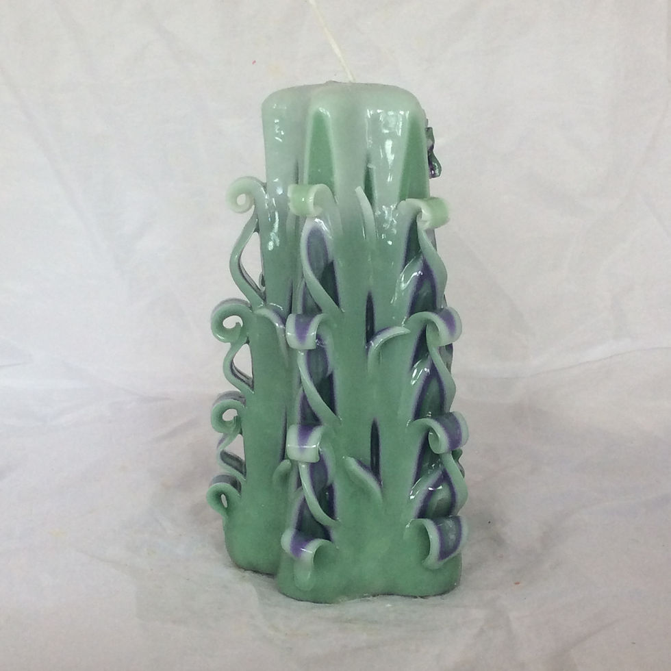 Green carved birthday candle