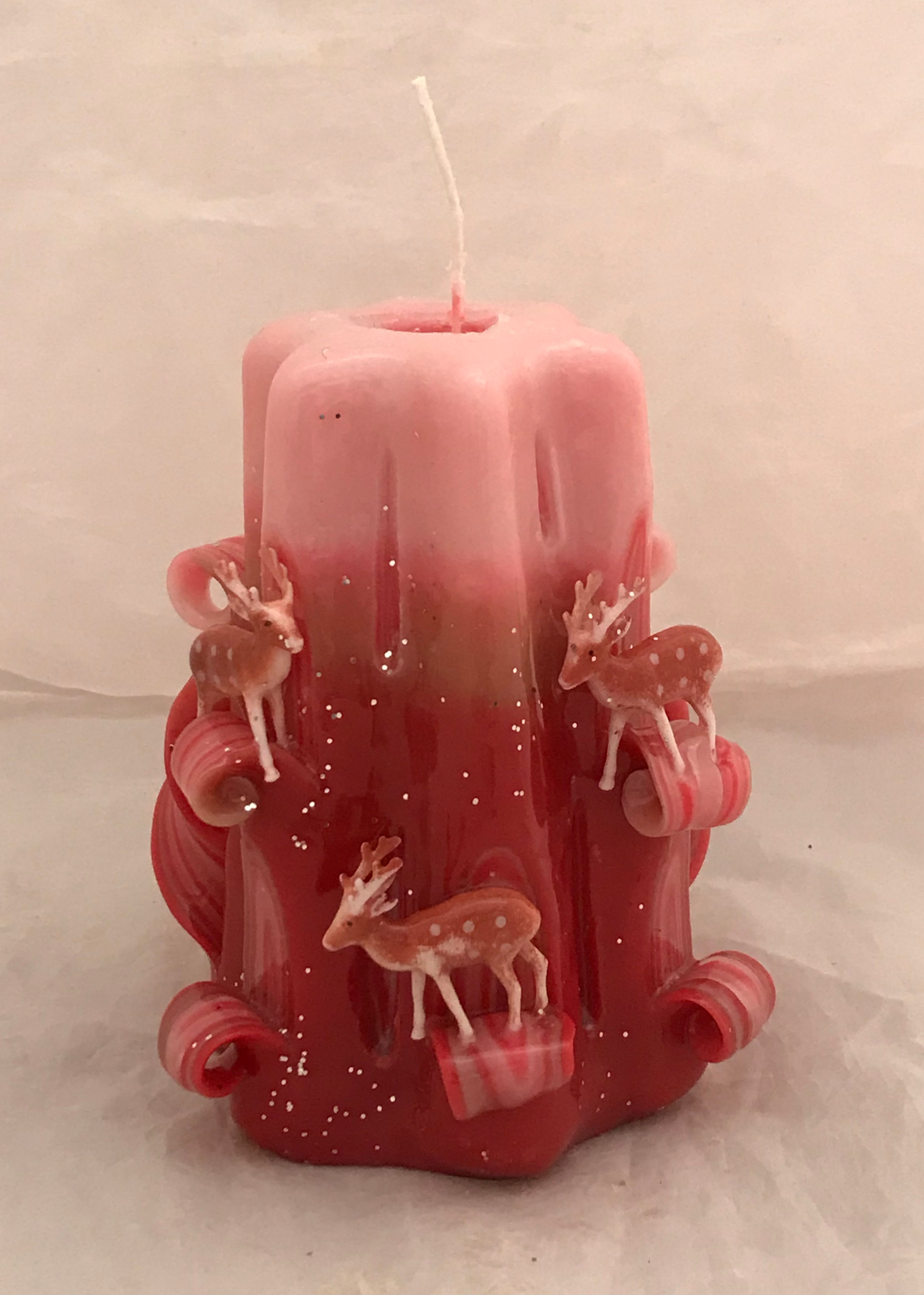 Carved candle with 3 reindeers
