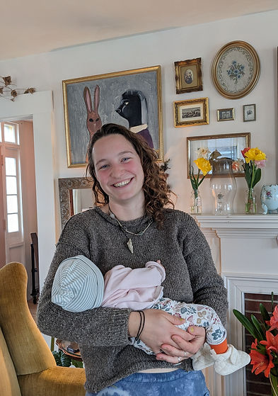 Postpartum doula Lila Foster, founder of Labyrinth Postpartum Care, offering mother-centered, holistic support for postpartum recovery and healing