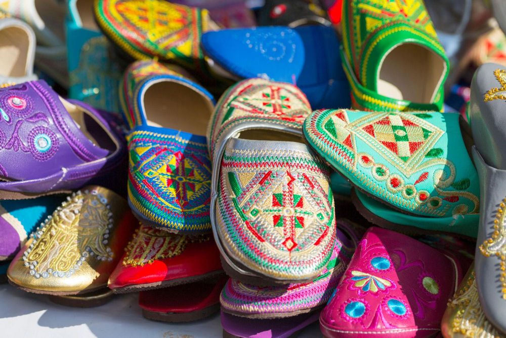 Traditional colorful shoes in a market in Tetouan, Morocco