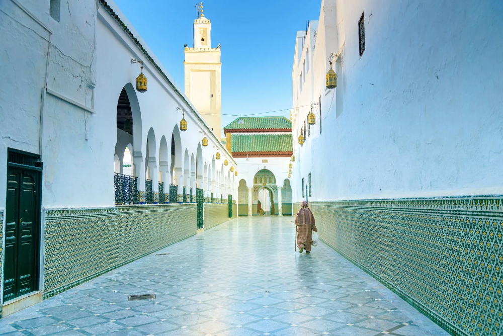beutifull view of a Moroccan designed alley next to a mosque in moulay idriss zerhoun  city