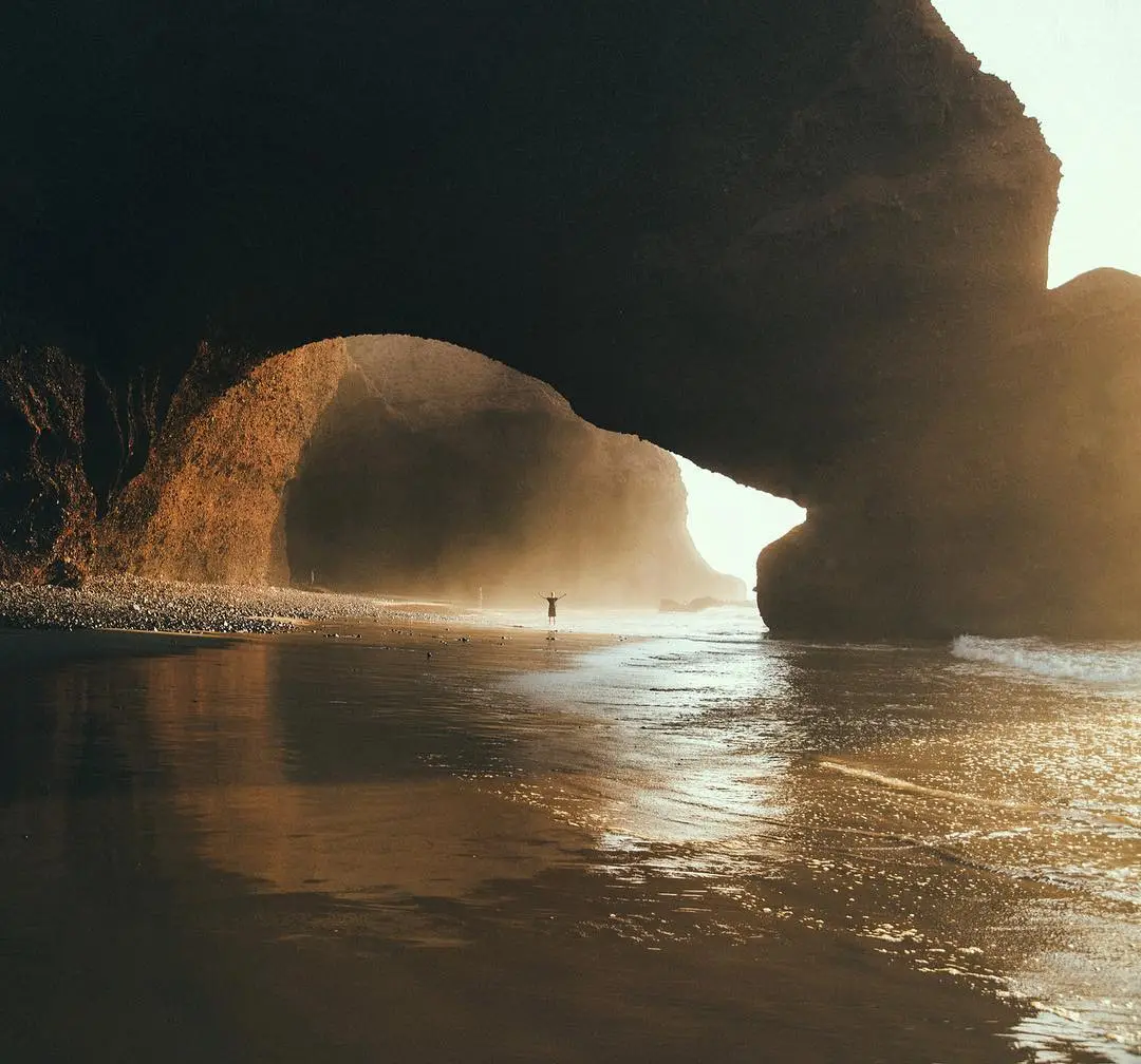 the famous arc in legzira beach in morocco